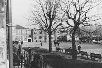 View across quad towards the new science block, 1959
